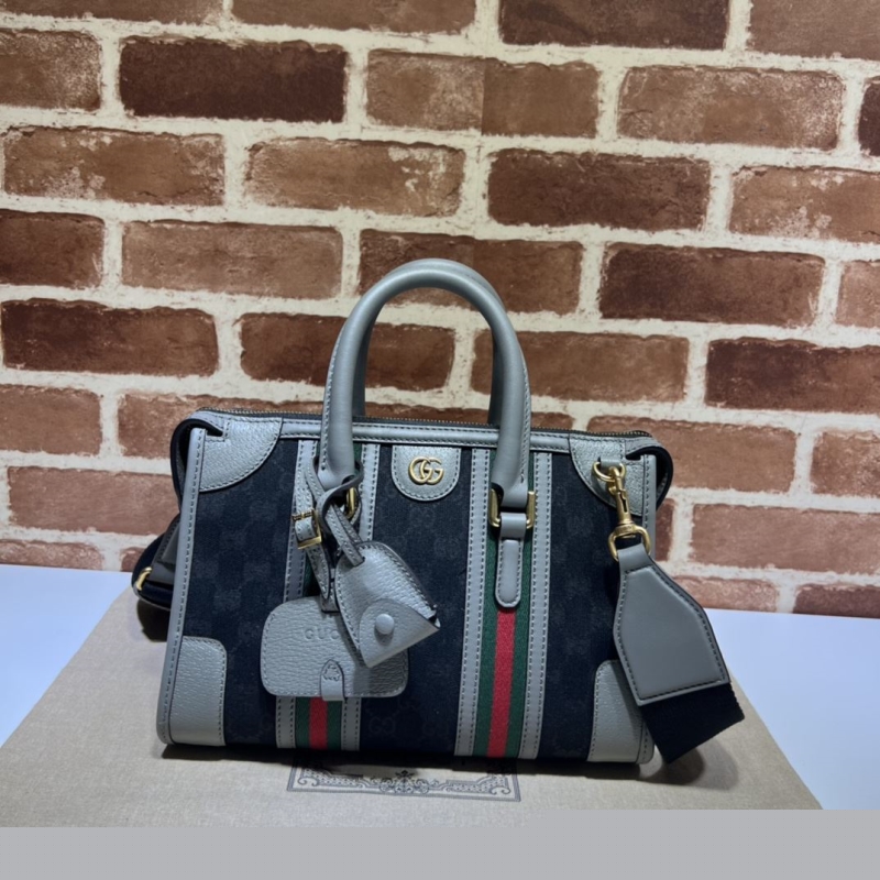 G*u*i top handle bags